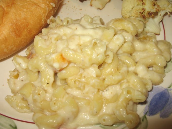 Baked Macaroni and Cheese - Why eat boxed macaroni and cheese when you can easily make it homemade? This dish is melt-in-your-mouth delicious! virginiasweetpea.com #macaroniandcheese #macandcheese
