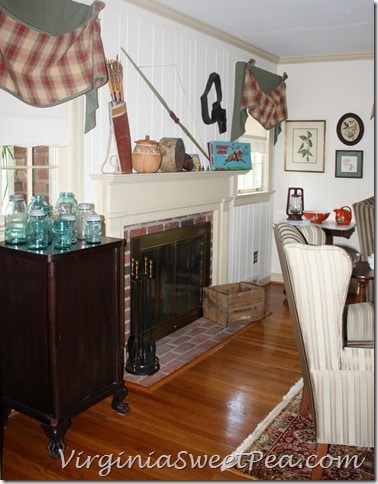 Living Room with Cowboy and Indian Themed Mantel