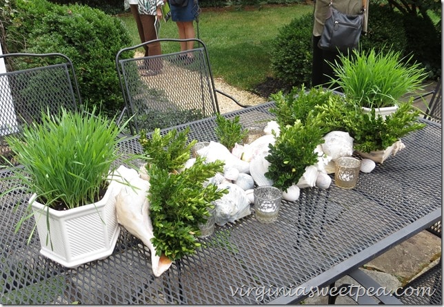 Table Arrangement with greenery and shells