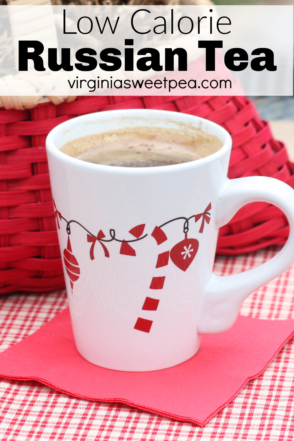 Low calorie Russian Tea in a mug decorated with candy canes and Christmas ornaments