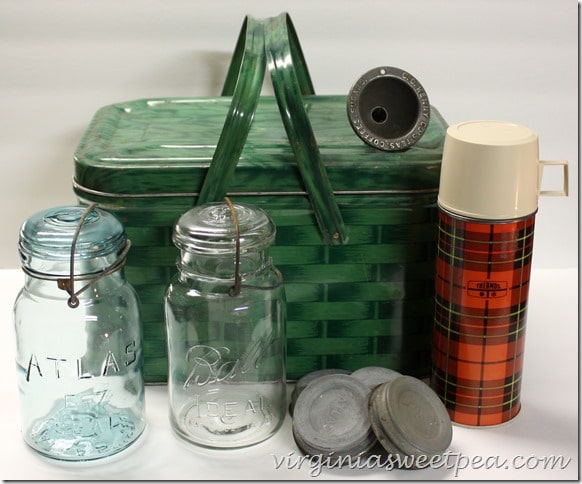 Vintage picnic basket, jars, and thermos.  Perfect items for decorating with a vintage flair!