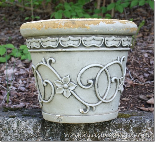 Learn how to revive worn flower pots like this one.  With paint, it can look like new.  virginiasweetpea.com