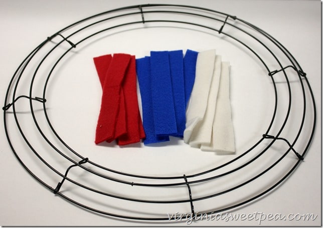 Make an easy Patriotic Wreath from fleece strips and a wire wreath form.  This is perfect for July 4 and other patriotic holidays.  virginiasweetpea.com