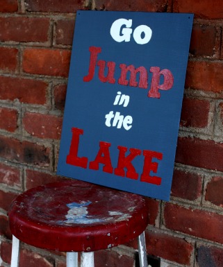 A "Go Jump in the Lake" sign is perfect for summer decor. Make your own using the provided printable. virginiasweetpea.com