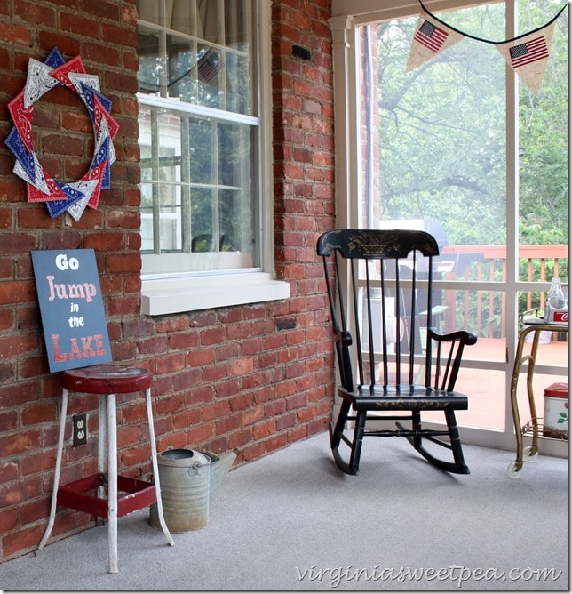 Patriotic Decor including a bandana wreath, flag banner, and a DIY "Go Jump in the Lake" sign.  virginiasweetpea.com