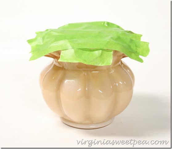 Masking tape over the top of the vase.