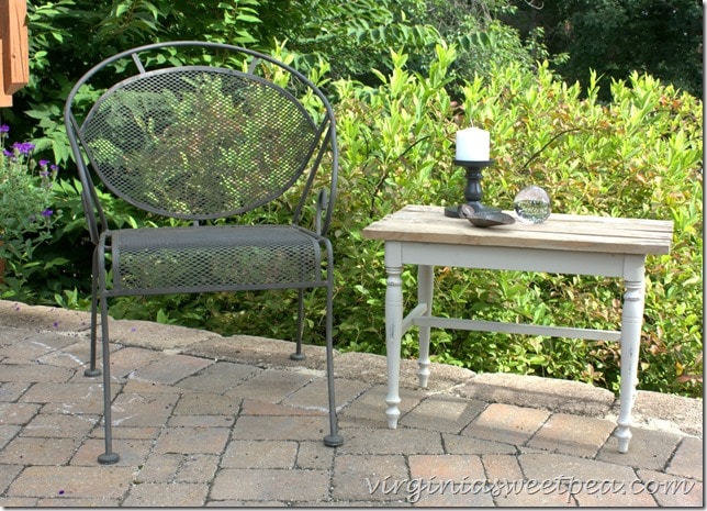 A vanity bench becomes a side table with paint and the addition of a pallet wood top. virginiasweetpea.com