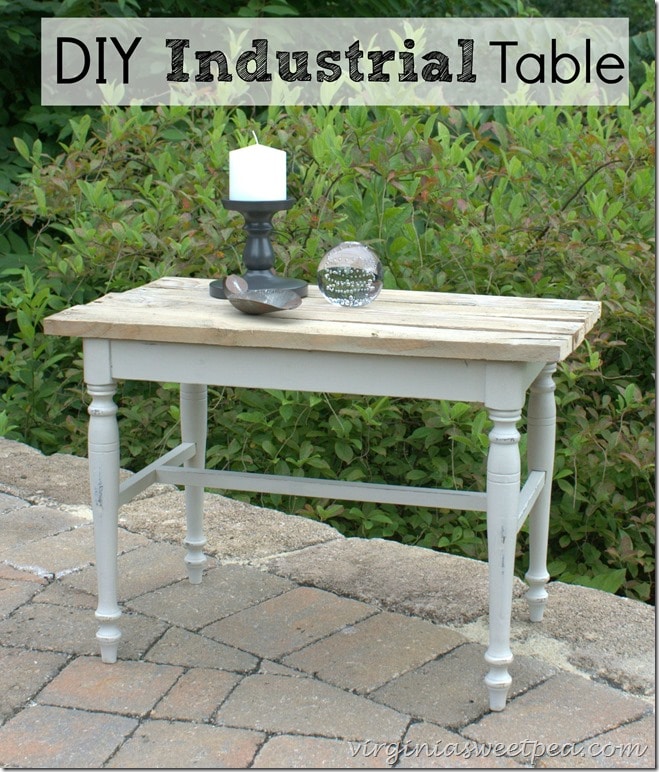 A vanity bench becomes a side table with paint and the addition of a pallet wood top. virginiasweetpea.com