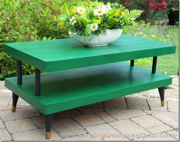 A mid-century coffee table gets a new look with Velvet Finishes paint and a touch of Rub 'n Buff on the feet. virginiasweetpea.com