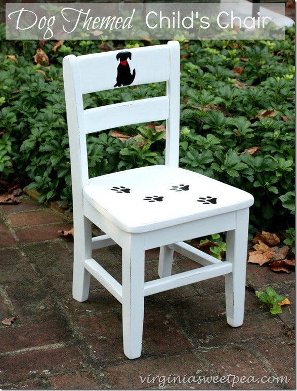 A painted dog and a seat covered with paw prints makes this child's chair charming. virginiasweetpea.com