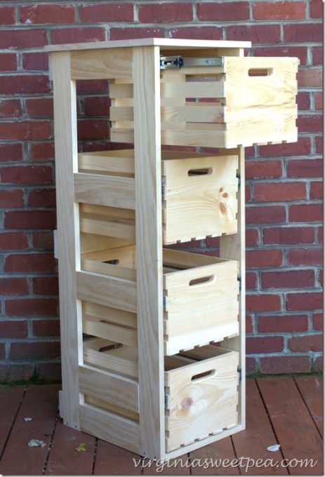 Crates from Home Depot were used to make a filing cabinet style crate cabinet with sliding doors. This can be used for storage anywhere in the home. #diy #diyproject #crate #diyproject