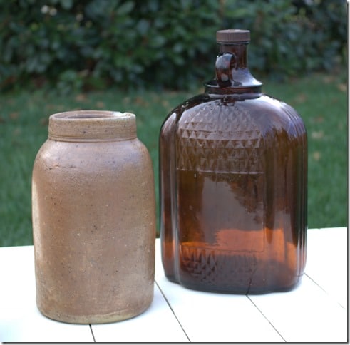 Brown Clorox Bottle and Antique Crock