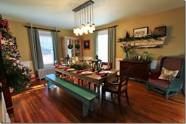 Farmhouse style dining room decorated for Christmas.
