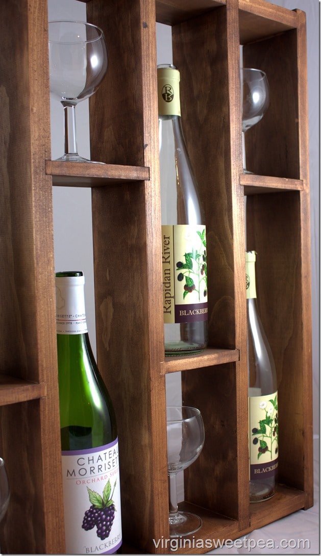 DIY Wine Rack - Follow this step-by-step tutorial to make a wine rack that displays favorite wines and glasses.
