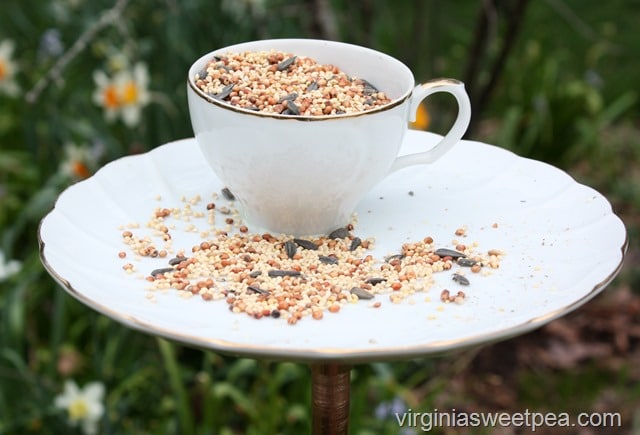 Make a bird feeder using a vintage snack set or a cup and saucer. This easy to follow tutorial shows you step-by-step how to make your own.