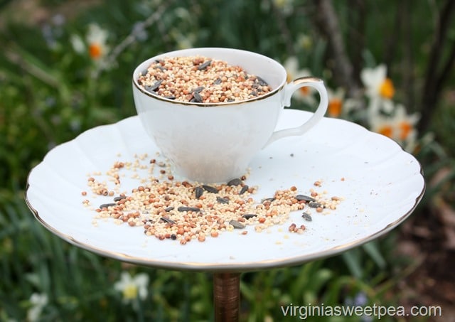 Learn how to make a bird feeder out of a vintage snack set or a cup and saucer.