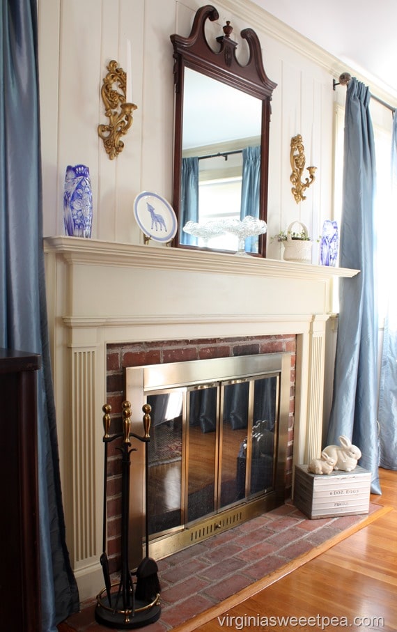 Spring Mantel in the Living Room - Vintage and antiques are displayed for spring. virginiasweetpea.com