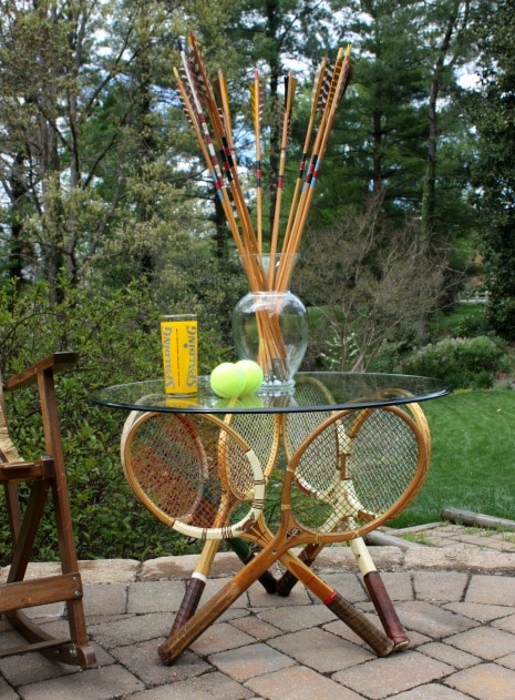 Make a table base using six vintage tennis rackets.