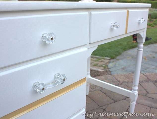 Clear glass pulls and knobs used on a desk makeover.  virginiasweetpea.com