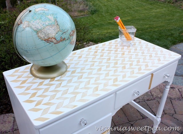 Herringbone stenciled desk top on an Ethan Allen desk made over.