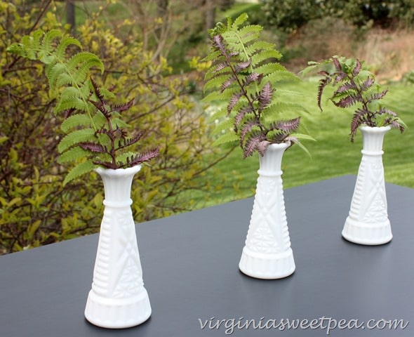 Vintage milk glass vases with fern fronds