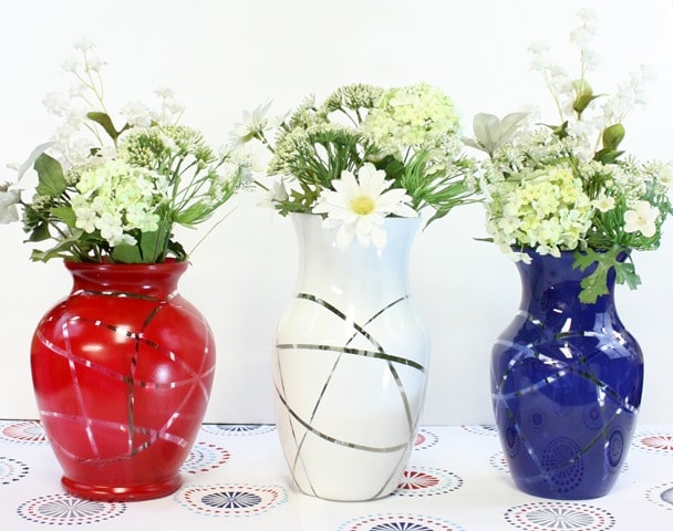 Upcycled Patriotic Vases - Make these using crafts from the thrift store, rubber bands, and spray paint. virginiasweetpea.com