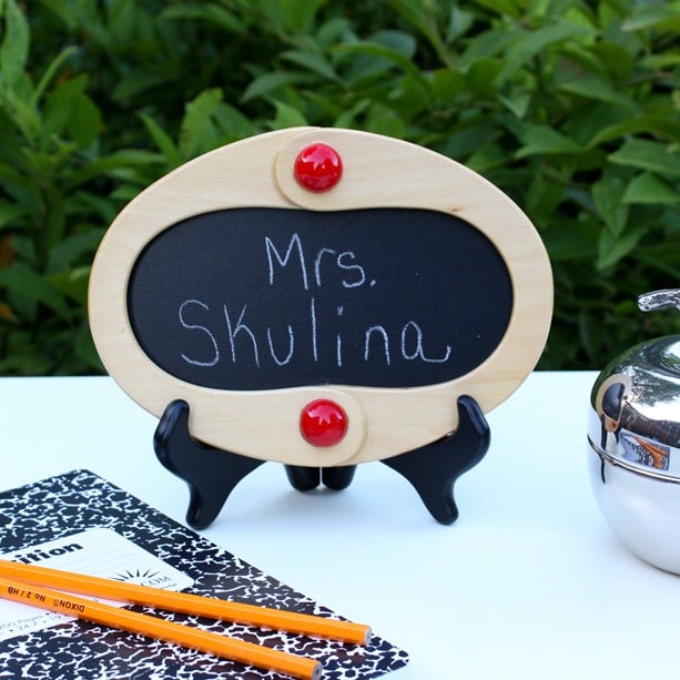 Wooden handles from a thrift shop purse were used to make this framed chalkboard. Get the full tutorial at virginiasweetpea.com.