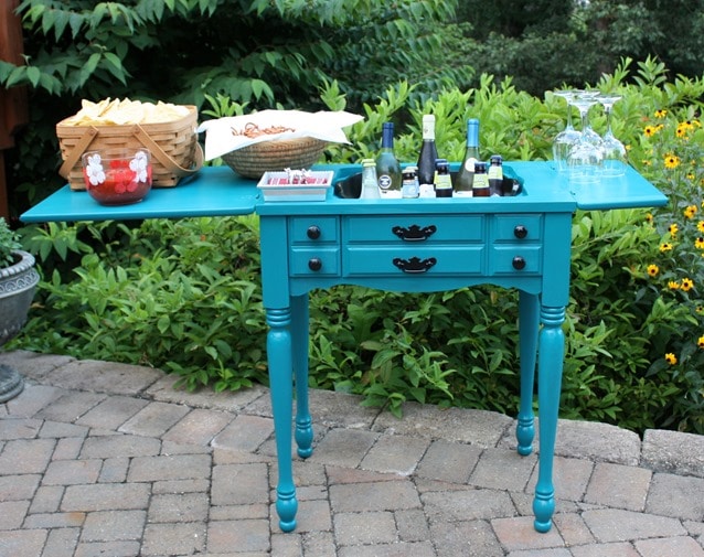 A former sewing cabinet is now an outdoor bar and serving area. This would be so handy to use for entertaining outdoors. virginiasweetpea.com