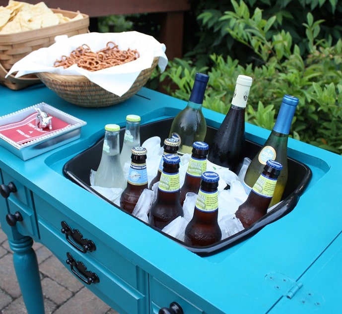 A sewing cabinet is made over into an outdoor bar with an inset sink. Get the full tutorial at virginiasweetpea.com.