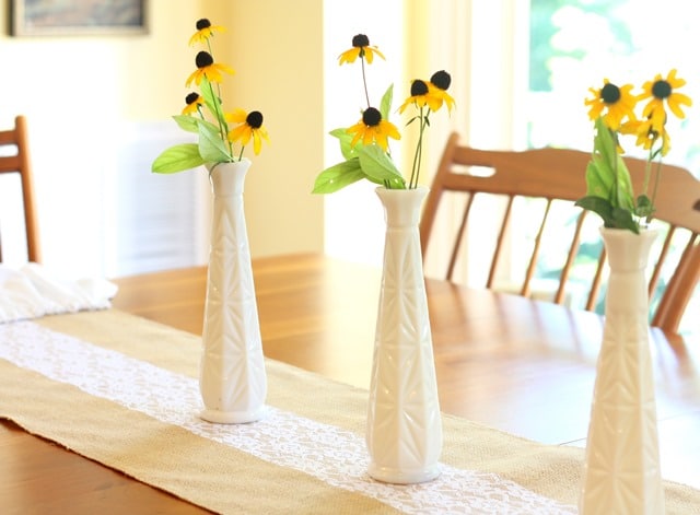 Milk glass vases filled with summer blooms are the perfect late summer centerpiece. virginiasweetpea.com