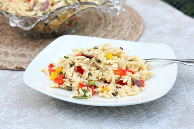 Orzo Salad with Feta, Olives and Peppers is a great side dish. Get the recipe at virginiasweetpea.com.