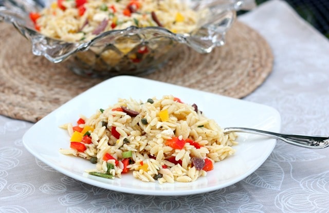 Orzo Salad with Feta, Olives and Peppers is a great side dish. Get the recipe at virginiasweetpea.com.