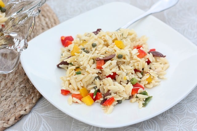 Orzo Salad with Feta, Olives and Peppers is a great side dish. Get the recipe at virginiasweetpea.com.