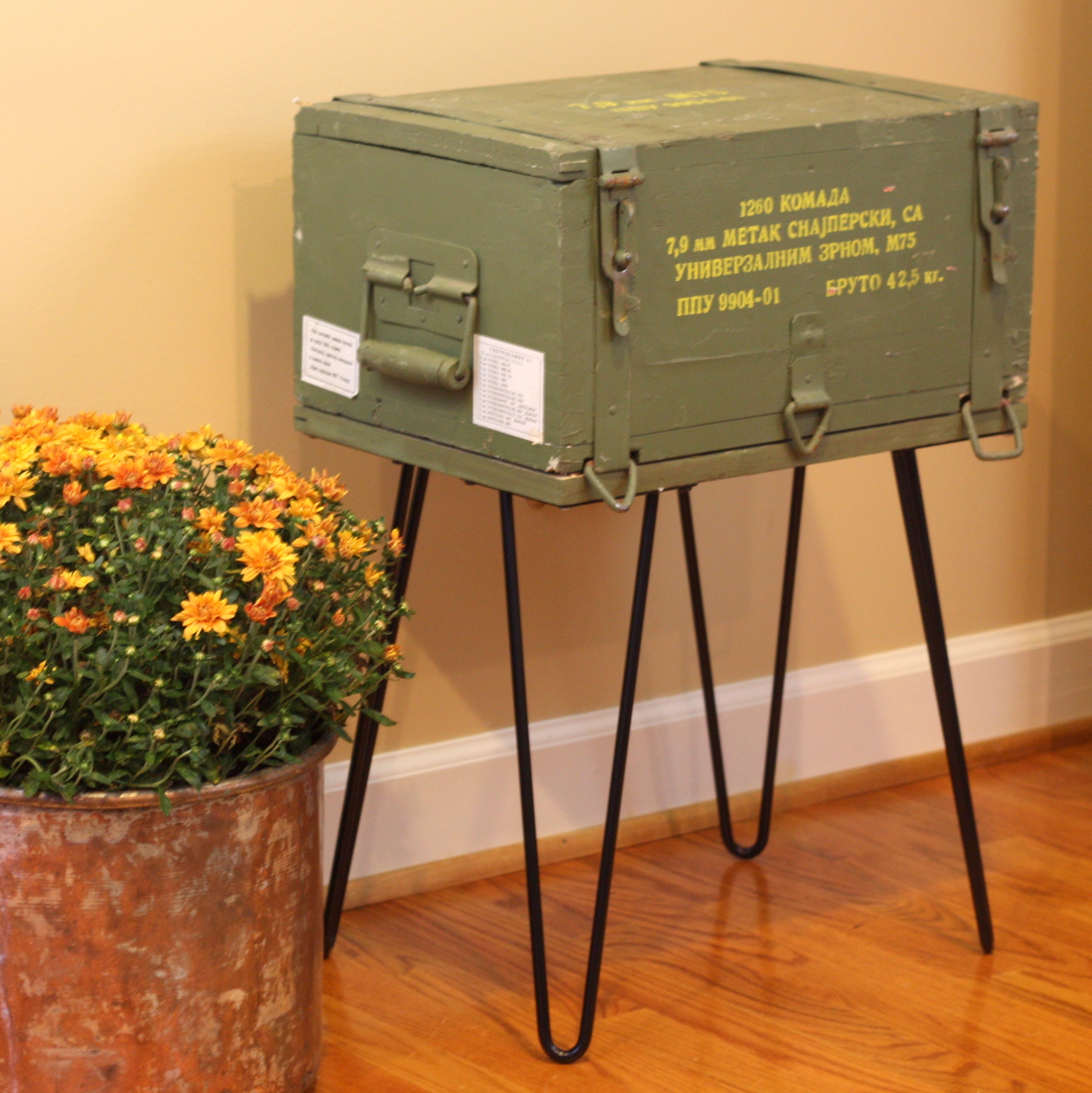 A Cold War era ammunition crate is repurposed into a table. Get the details at virginiasweetpea.com.