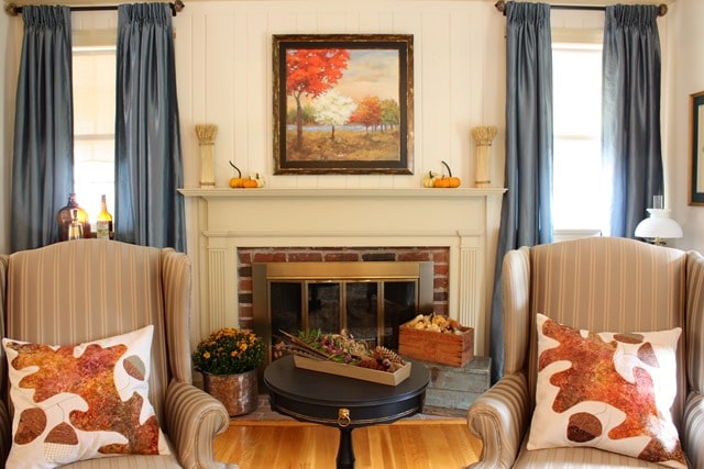 Fall Mantel and Living Room Decor - Get ideas for decorating your mantel and living room for fall. #fall #falldecor #fallvignette #falldecorating #fallmantel
