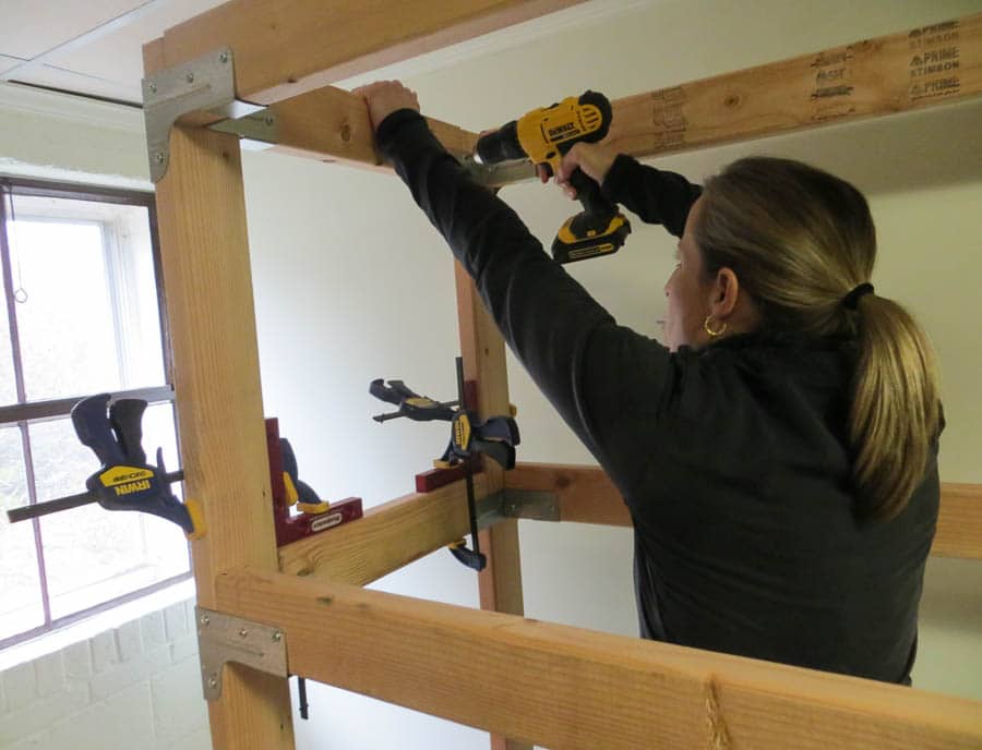 Assembling shelving unit