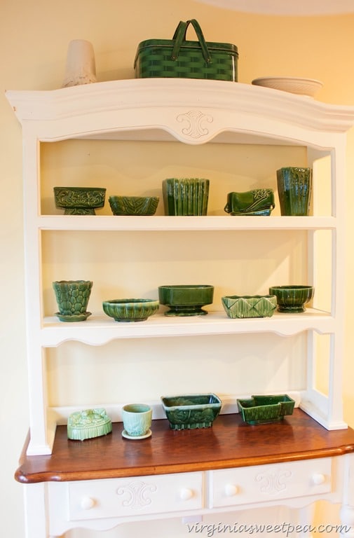 Vintage Green Pottery Displayed on a Farmhouse Hutch
