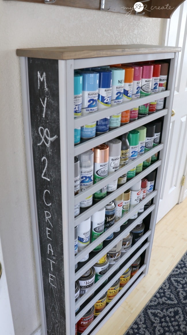 Crib Repurposed into a a Paint Storage Shelf