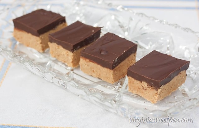 Chocolate frosted treats on a cut glass plate.