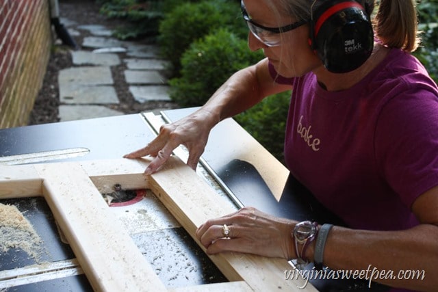 How to Make a DIY 2x4 Porch Swing - Get the step-by-step directions at virginiasweetpea.com