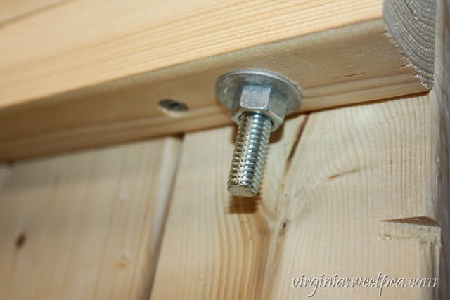 How to Make a DIY 2x4 Porch Swing - Get the step-by-step directions at virginiasweetpea.com