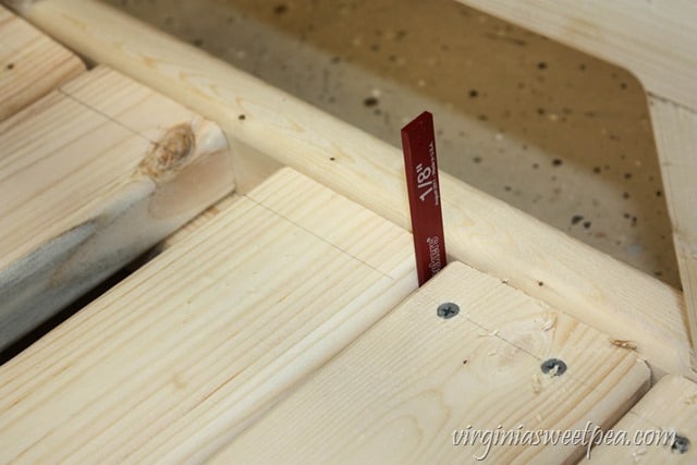 How to Make a DIY 2x4 Porch Swing - Get the step-by-step directions at virginiasweetpea.com