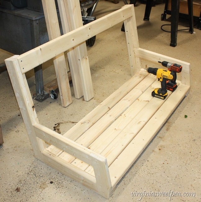 How to Make a DIY 2x4 Porch Swing - Get the step-by-step directions at virginiasweetpea.com