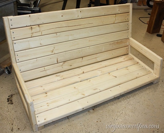 How to Make a DIY 2x4 Porch Swing - Get the step-by-step directions at virginiasweetpea.com