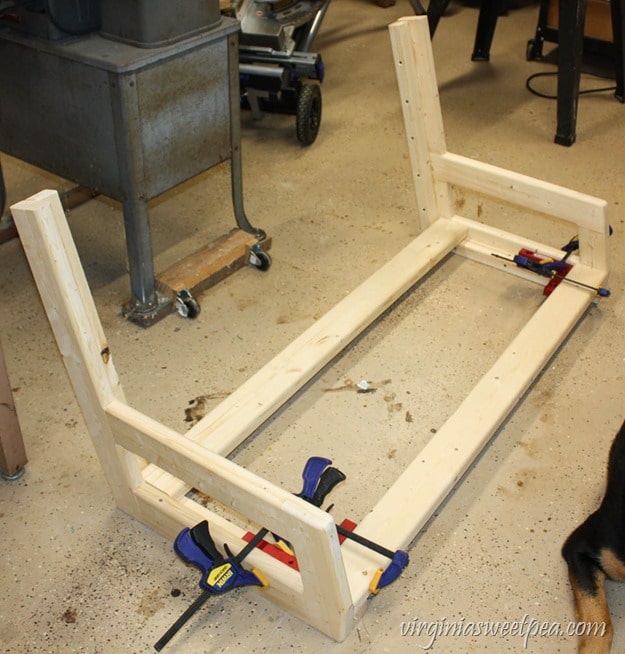 How to Make a DIY 2x4 Porch Swing - Get the step-by-step directions at virginiasweetpea.com