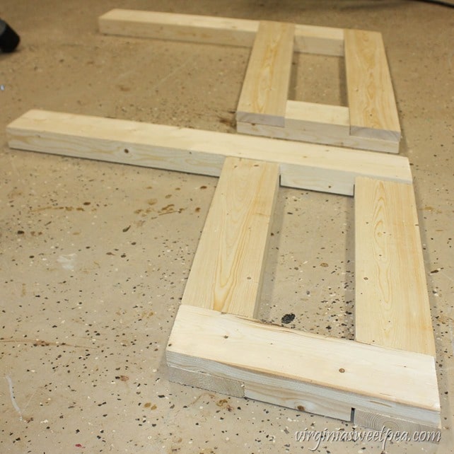 How to Make a DIY 2x4 Porch Swing - Get the step-by-step directions at virginiasweetpea.com