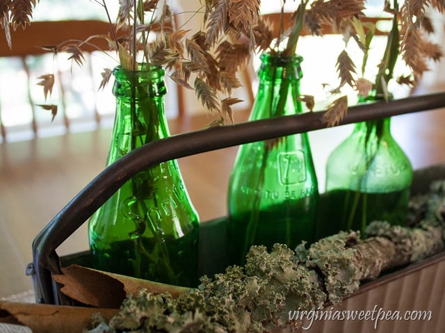 Vintage Green Soda Bottles in a Farmhouse Style Metal Tool Caddy - virginiasweetpea.com