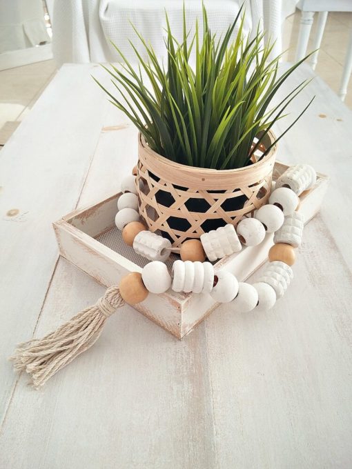 This wooden bead garland was made using a back massager from the thrift store!