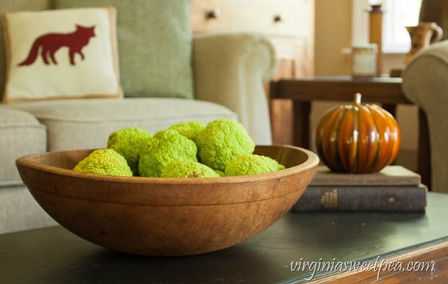 Fall Coffee Table Decor - Osage Oranges in a Vintage Bowl with Vintage Books and a Pumpkin - virginiasweetpea.com