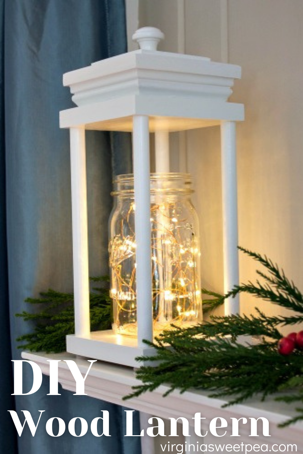 Handmade wood lantern on a mantel decorated for Christmas